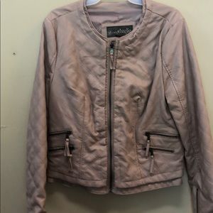 Women’s leather like jacket.